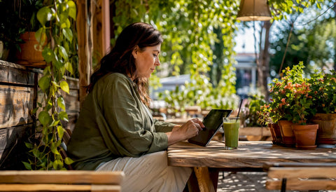 Woman selecting wellness brands on tablet